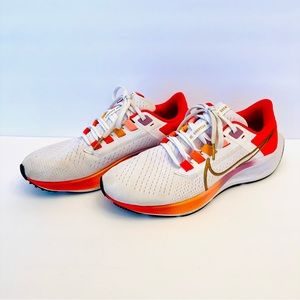 Nike Air Zoom Pegasus 38 in white/ metallic gold siren red, size 8